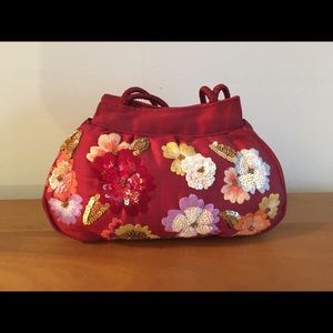 Precious Bracelet embroidered bag.